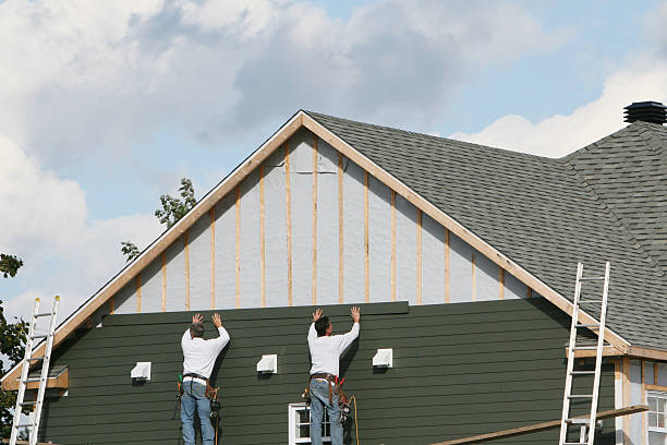 Professional Siding technician working in Laura, OH